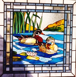 original design wood ducks by Tom Nelson