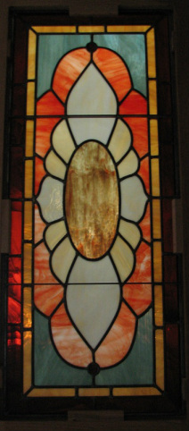 Original stained glass bird design by Tom Nelson