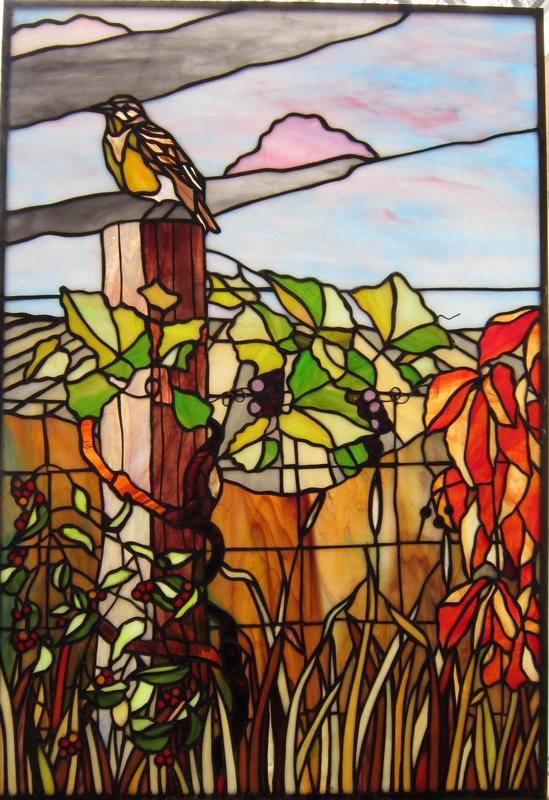 Stained glass meadow lark and vines birds