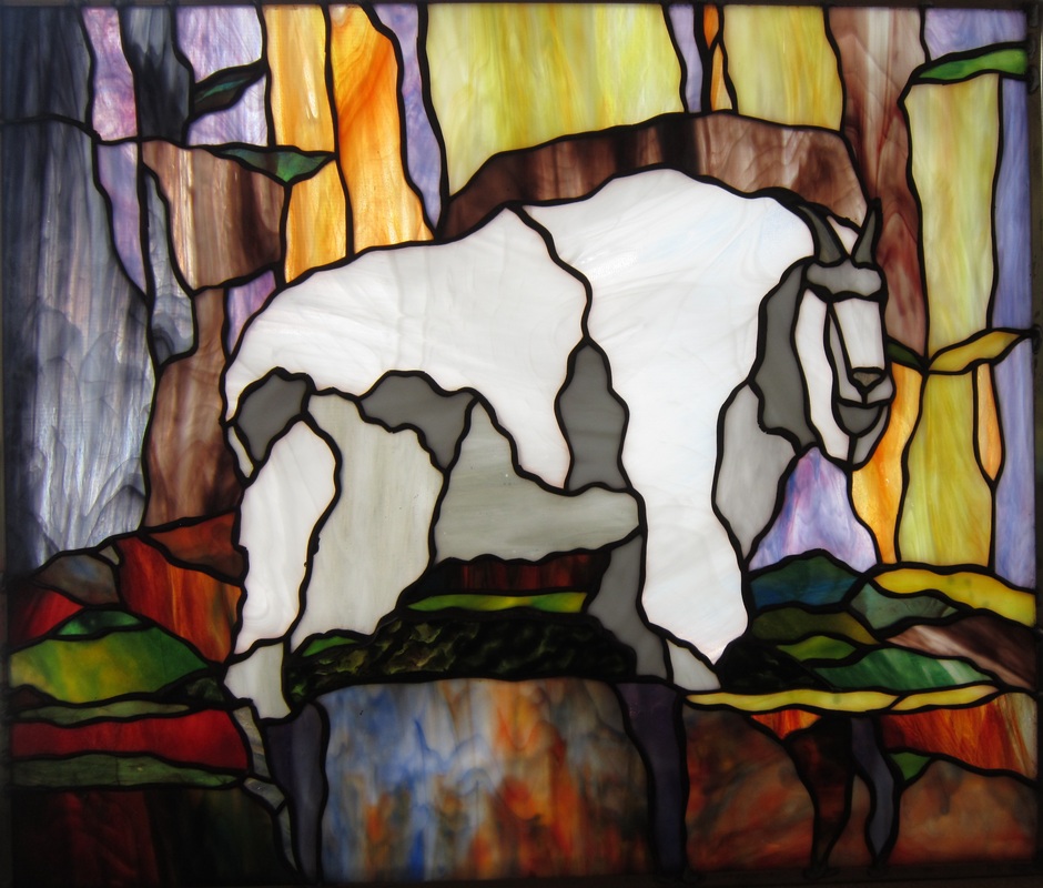 Stained glass mountain goat by spectrum stained glass studio