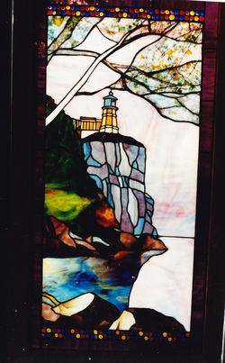 Custom stained glass split rock lighthouse in stained glass