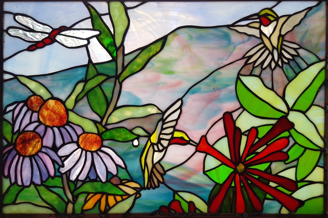 Stained glass birds and flowers original design by Tom Nelson