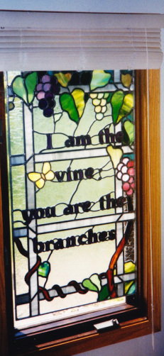 stained glass vine theme window